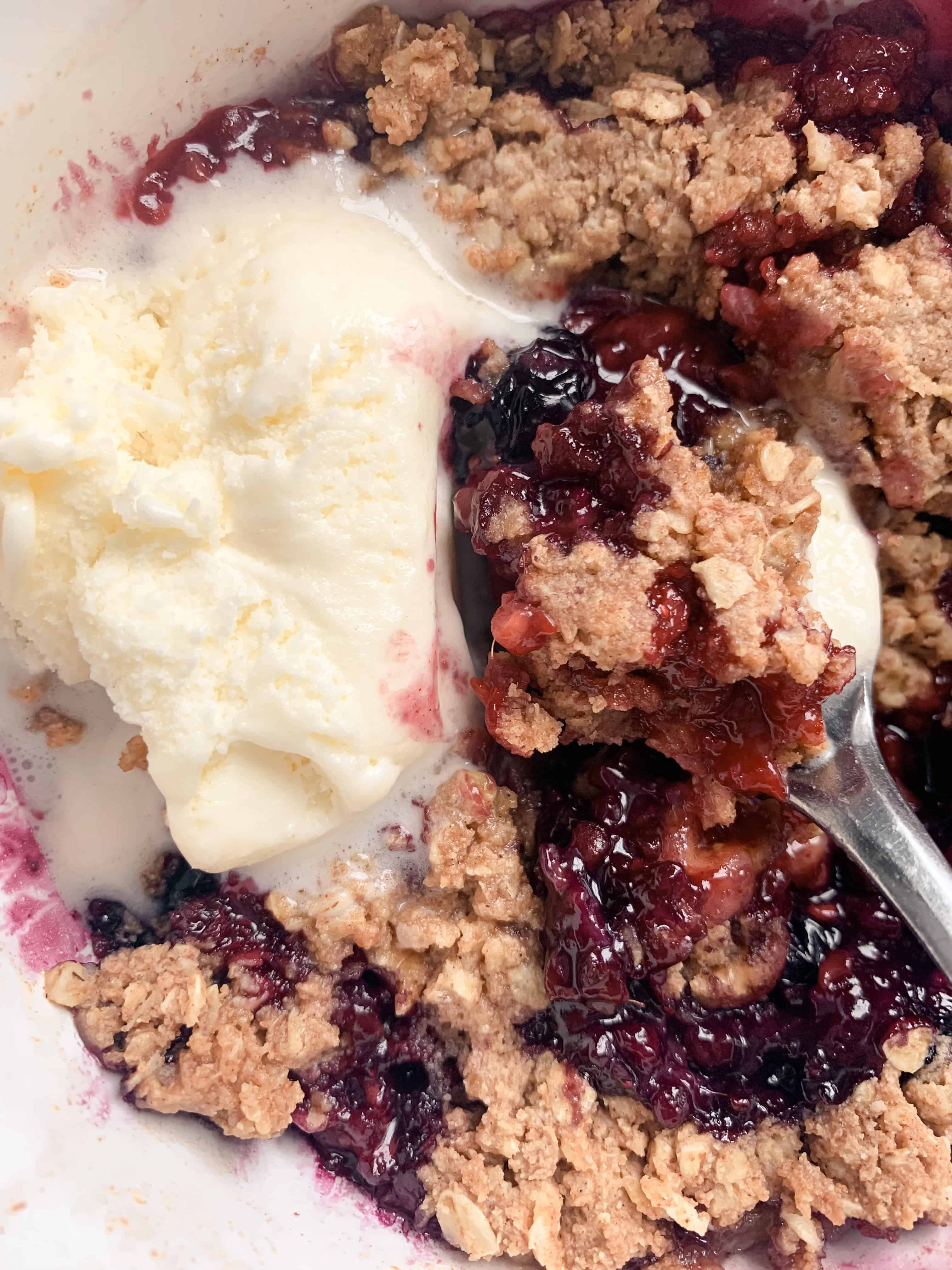 close up of microwave berry crumble