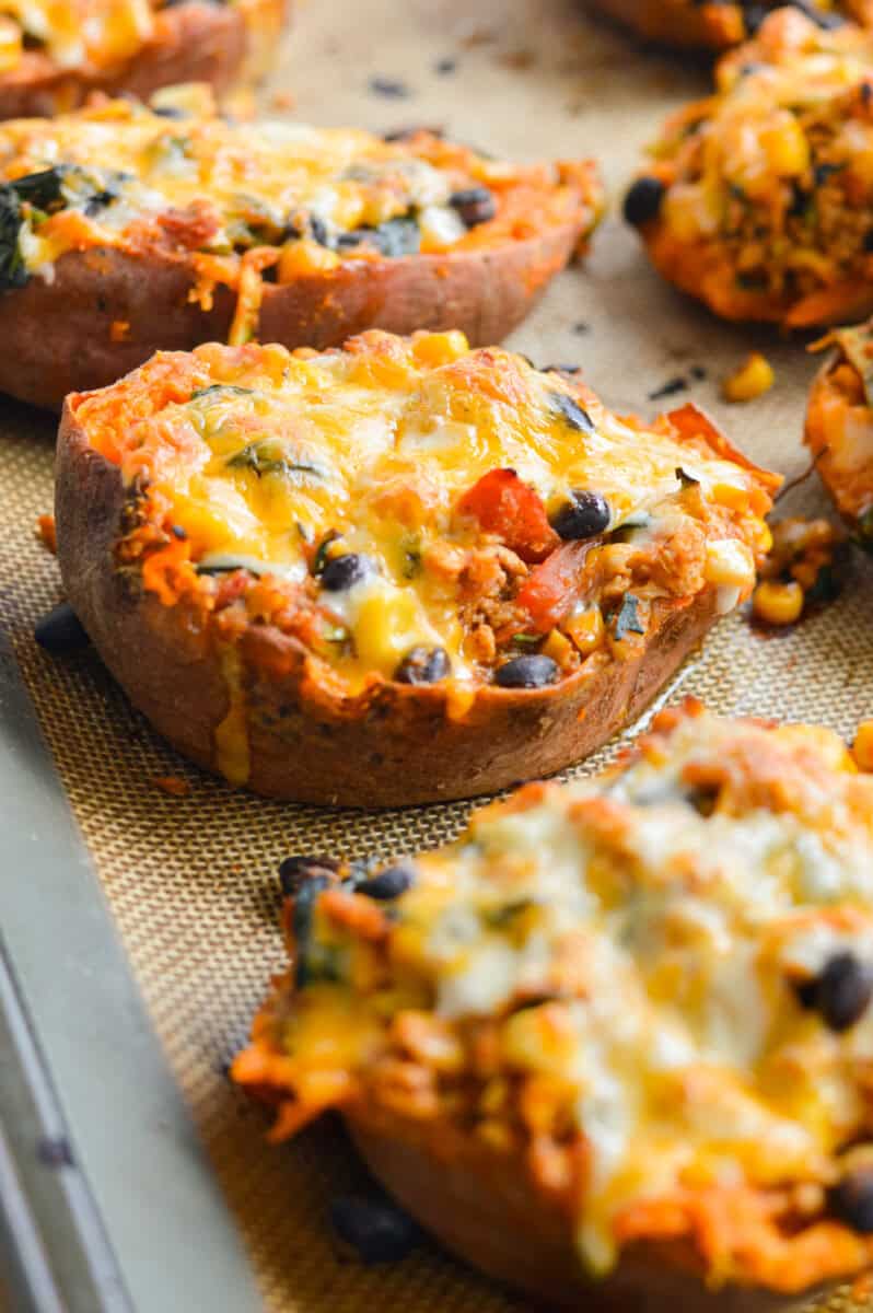 Close up of cheesy turkey stuffed sweet potatoes.