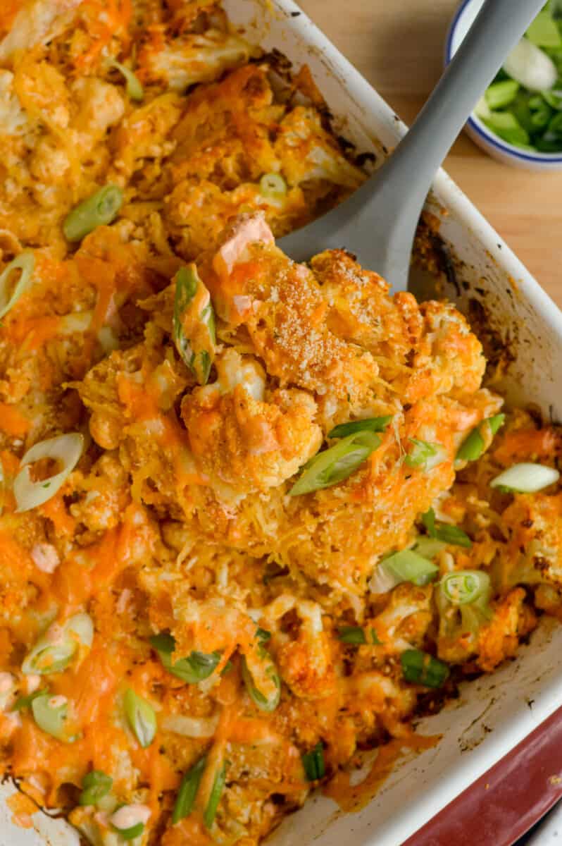 Birds eye of buffalo chicken spaghetti squash casserole with cheese and green onions.