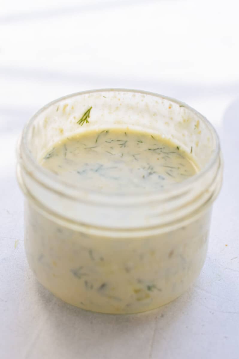 Jar of dill pickle salad dressing.
