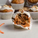 healthy carrot cake muffins with cream cheese frosting