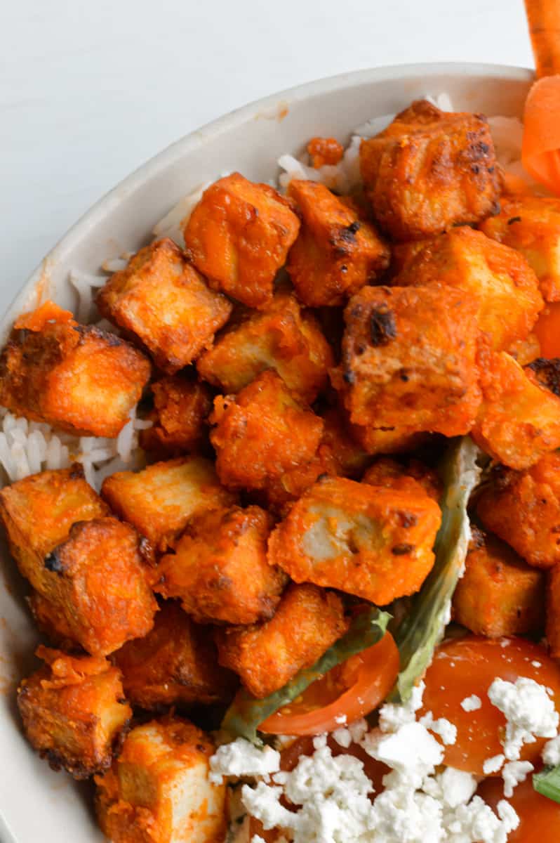 Close up of buffalo tofu in a bowl.