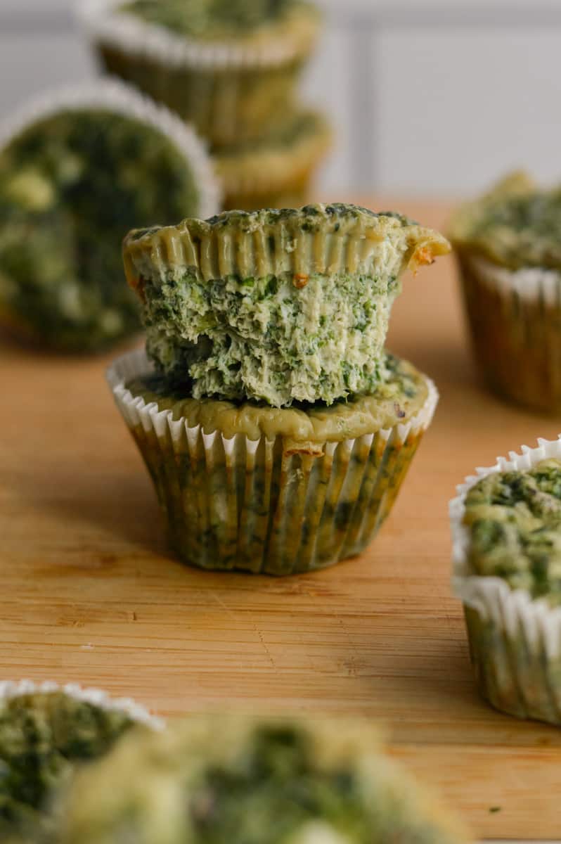Two spinach feta egg cups stacked.