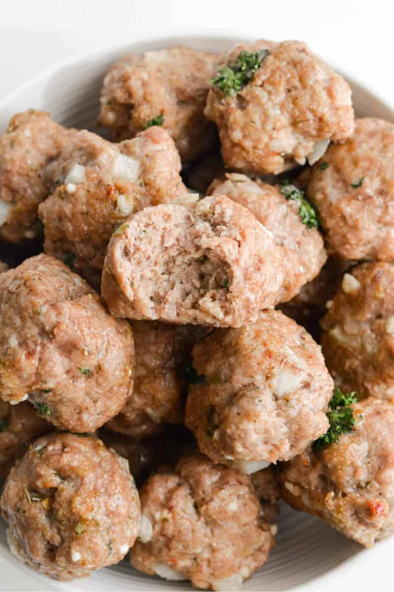 Close up of Greek turkey feta meatballs in a bowl.