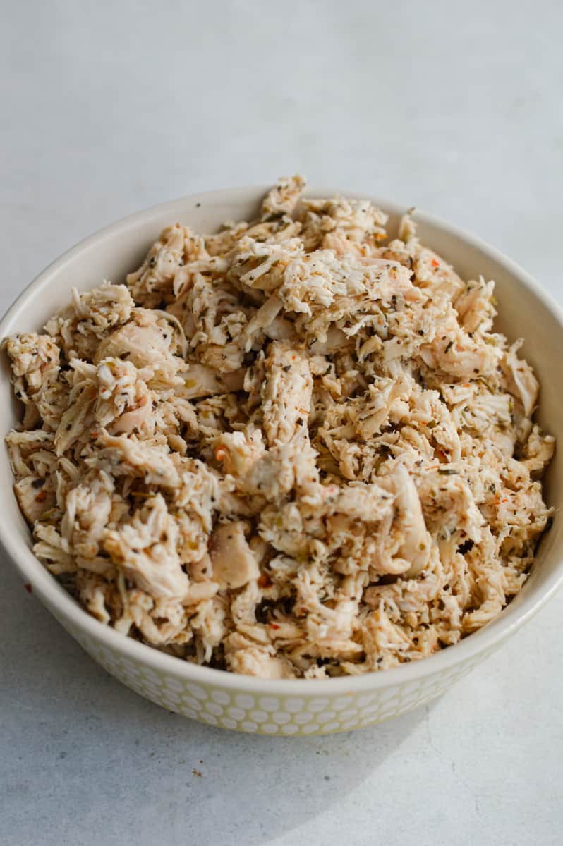 Shredding chicken.