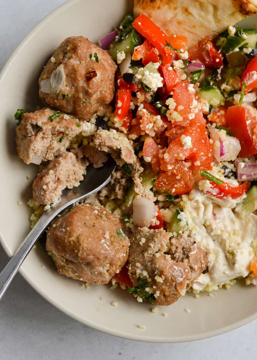 Turkey feta meatballs in a mediterranean bowl.