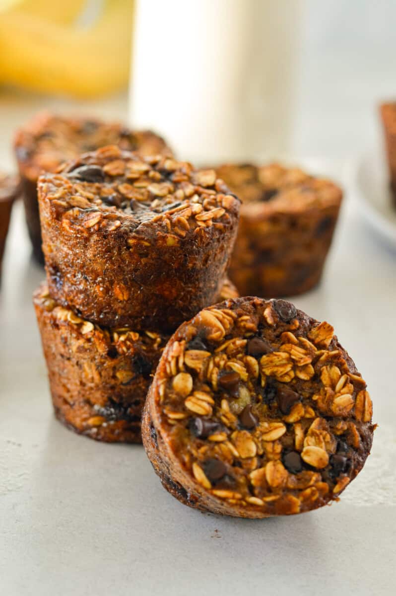 Stacked banana oatmeal chocolate chip muffins.