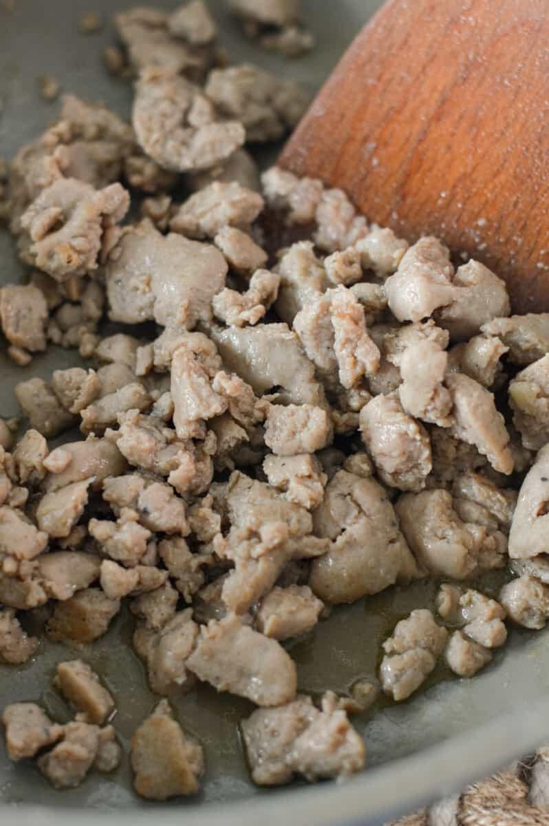 Cooking ground  sausage in a pan.