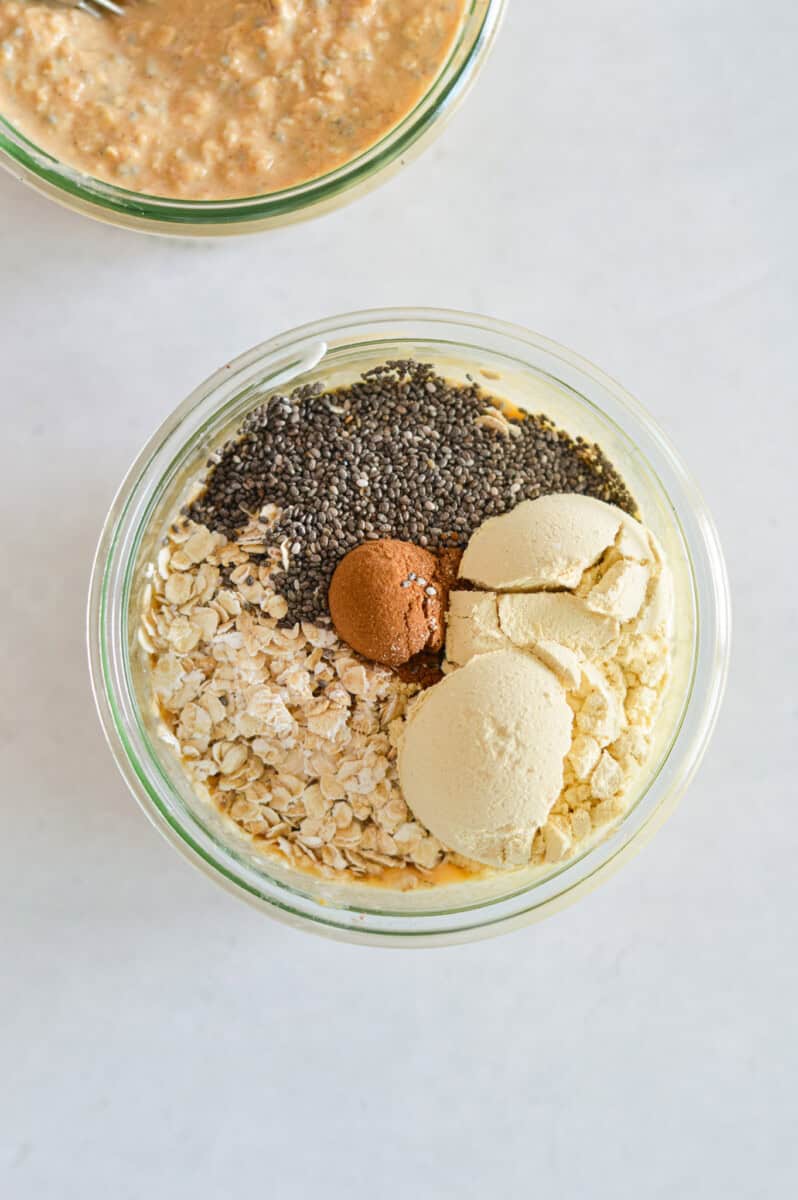 Mixing in oats, protein powder, spices and chia seeds.