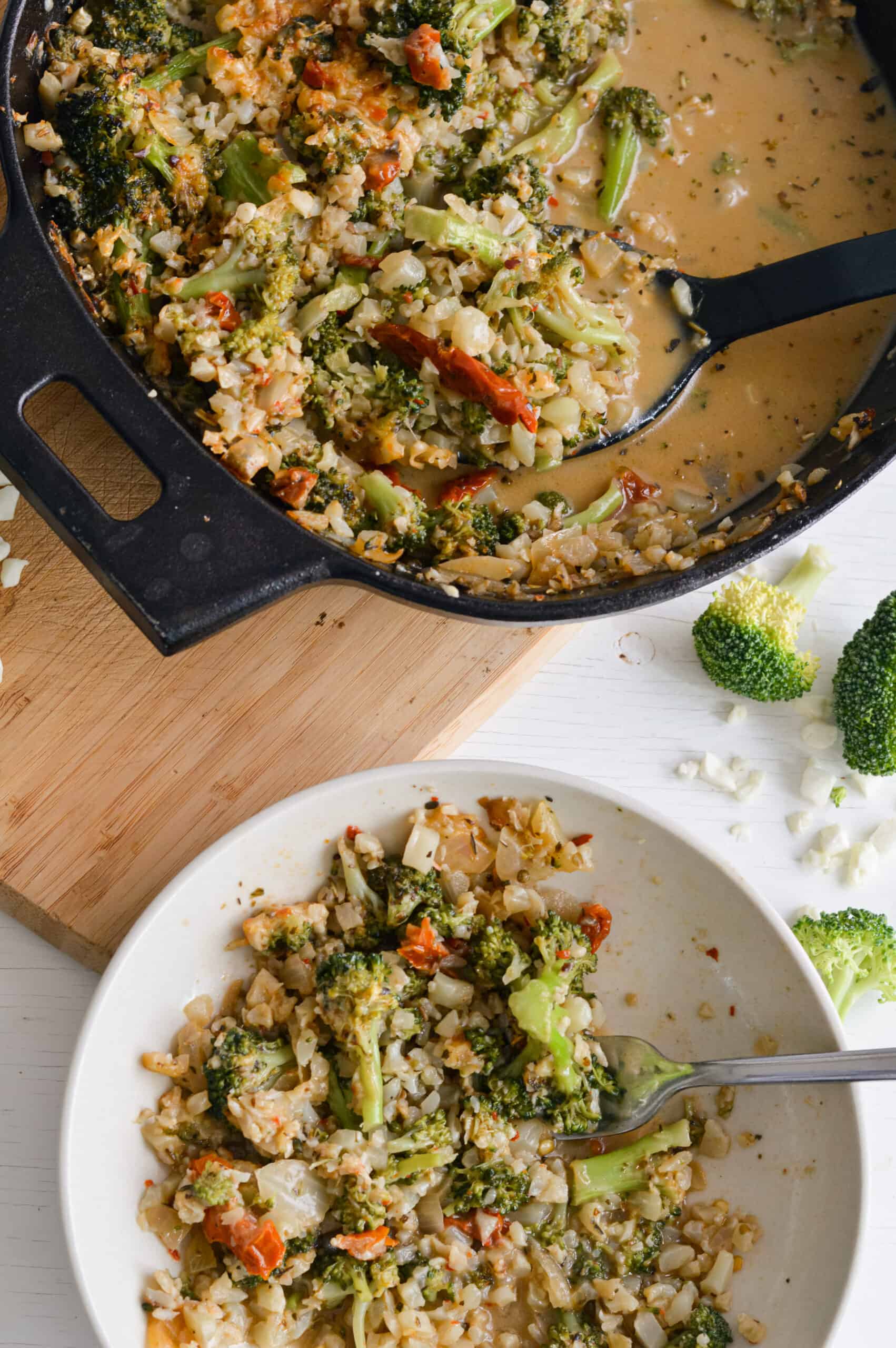 Serving healthy broccoli and cauliflower bake for a dinner party.