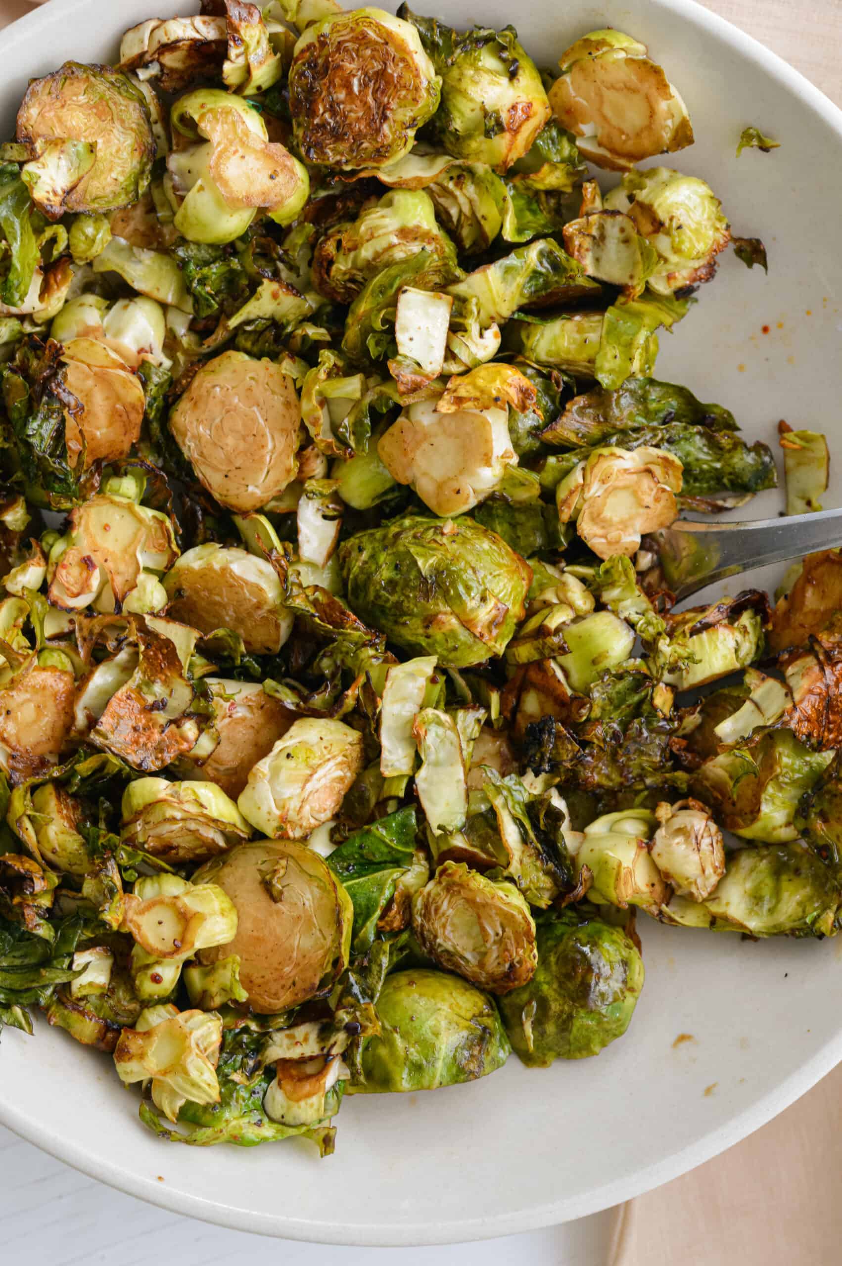 Bowl of shaved air fryer brussel sprouts.