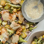 Birds eye of a sheet pan chicken and veggies with honey mustard sauce.