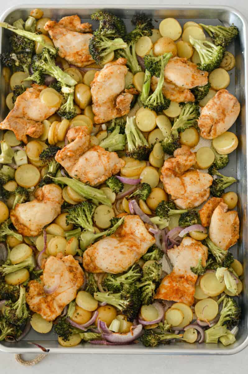 Birds eye of baked sheet pan chicken and veggies.