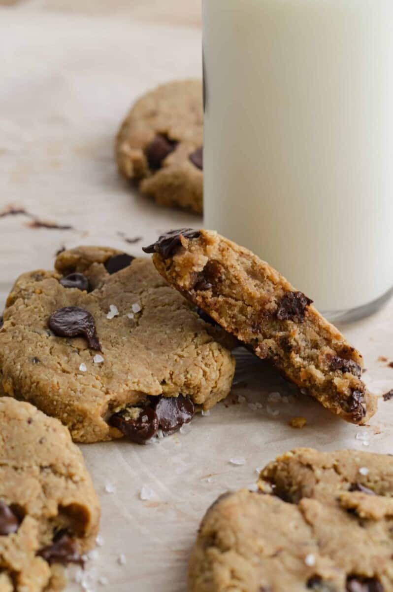 Close up of vegan protein cookies with a glass of milk.