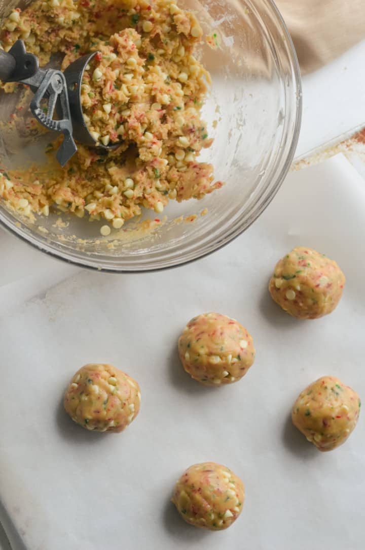 Rolling out peppermint cookie dough.