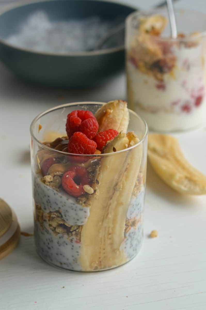 Layering parfait ingredients in a jar. 