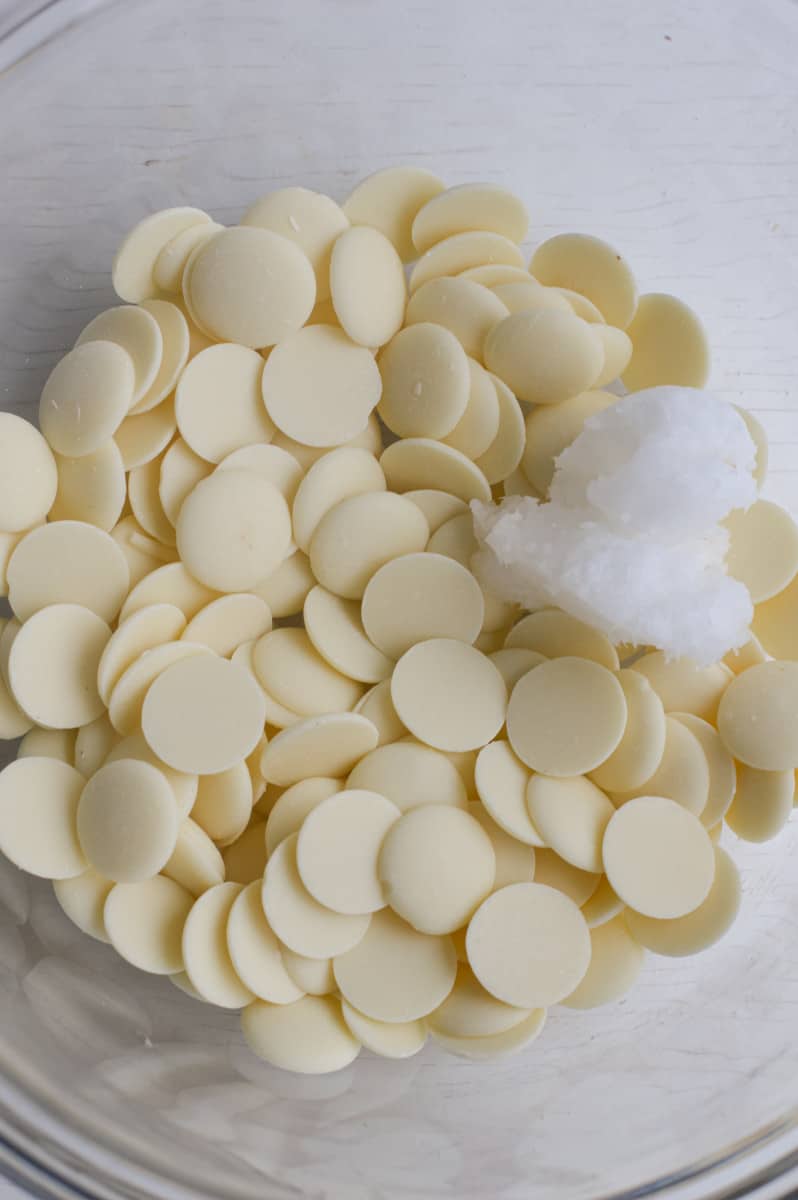 Melting white chocolate with coconut oil.