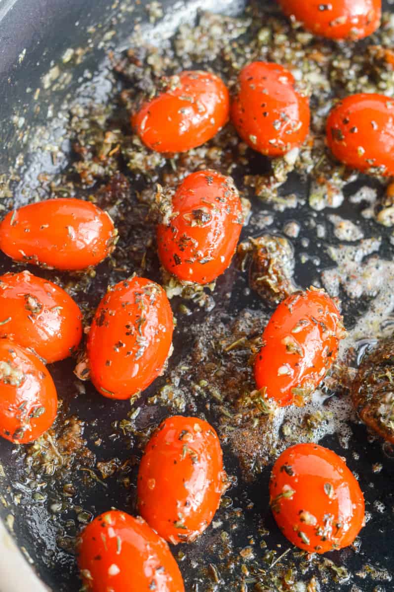 Sauteeing tomatoes in butter.