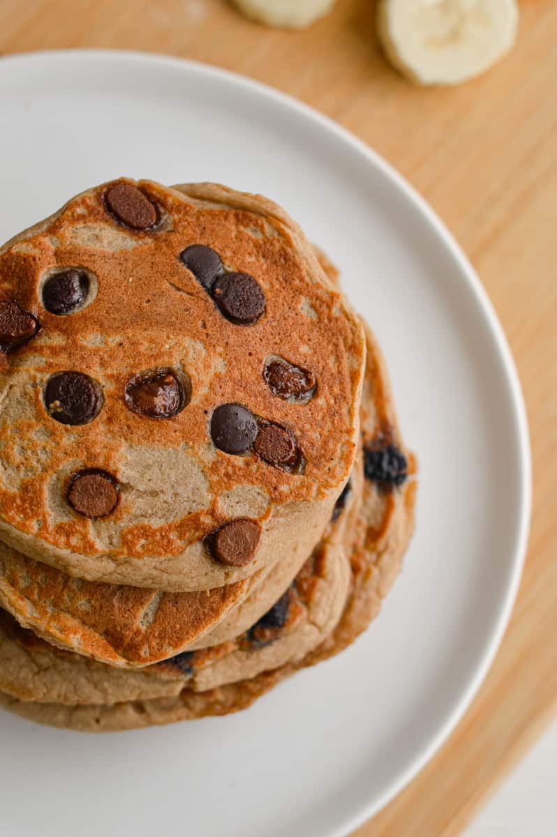 Stack of protein powder pancakes with chocolate chips.
