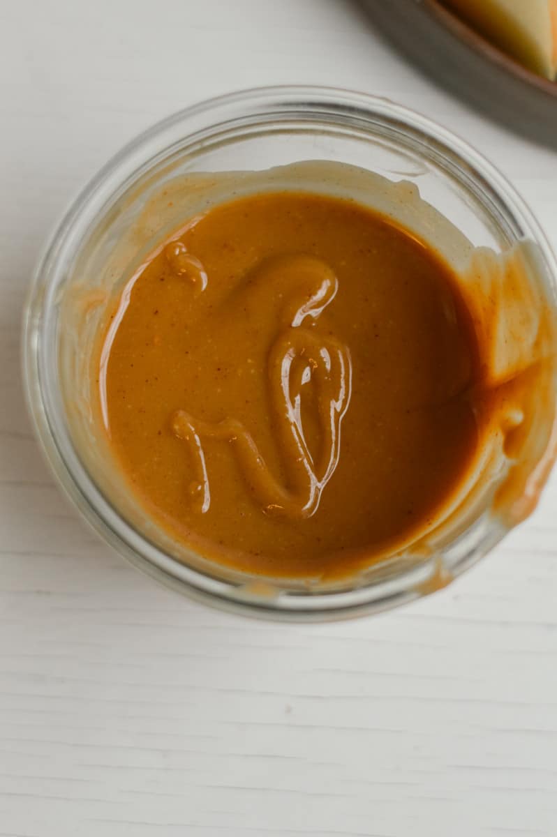 Microwaved peanut butter in a jar.