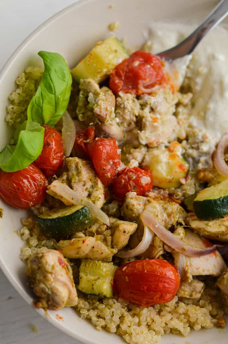 Close up of pesto chicken quinoa bowl.