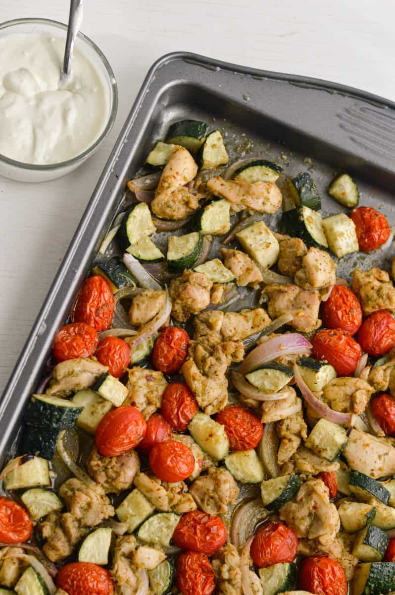 Sheet pan pesto chicken and vegetables.