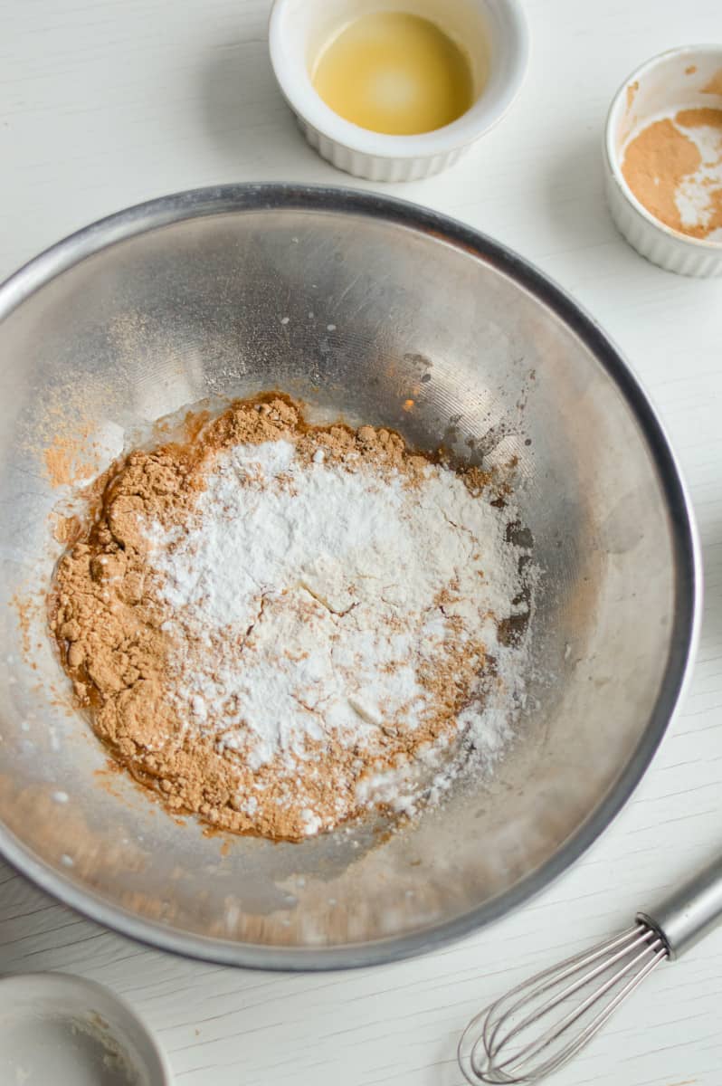 Mixing dry ingredients in a bowl.