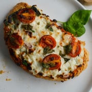 Savory cottage cheese toast on a plate.