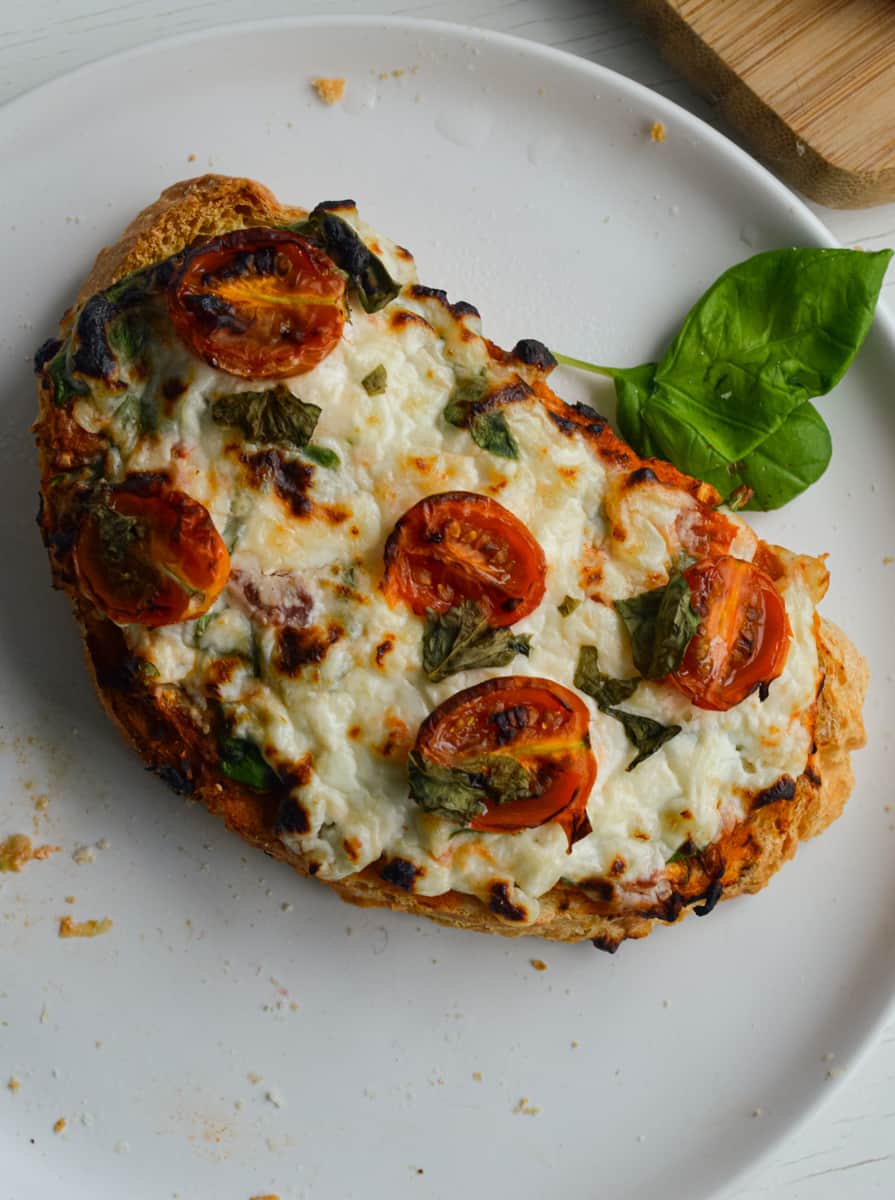 Savory cottage cheese toast on a plate.