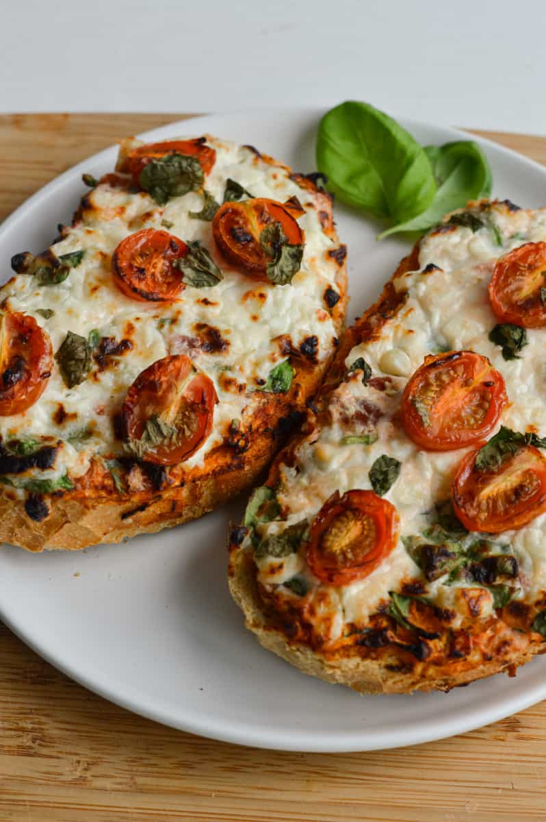 Two slices of cottage cheese toast on a plate.