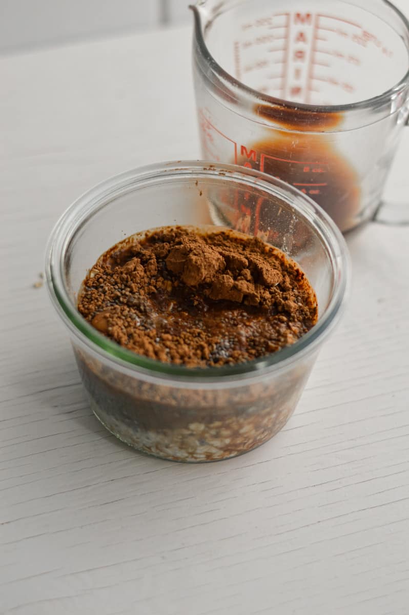 Mixing coffee base in a jar.