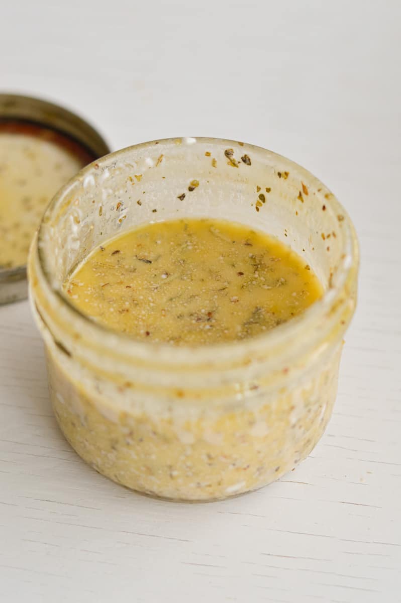 Whisking together creamy Italian dressing.