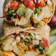 Close up of honey mustard chicken wrap sliced in half.