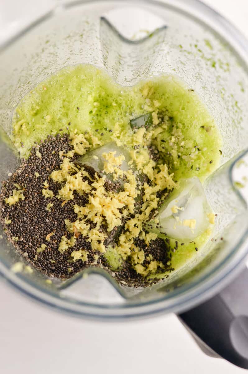 Adding ingredients to a blender.