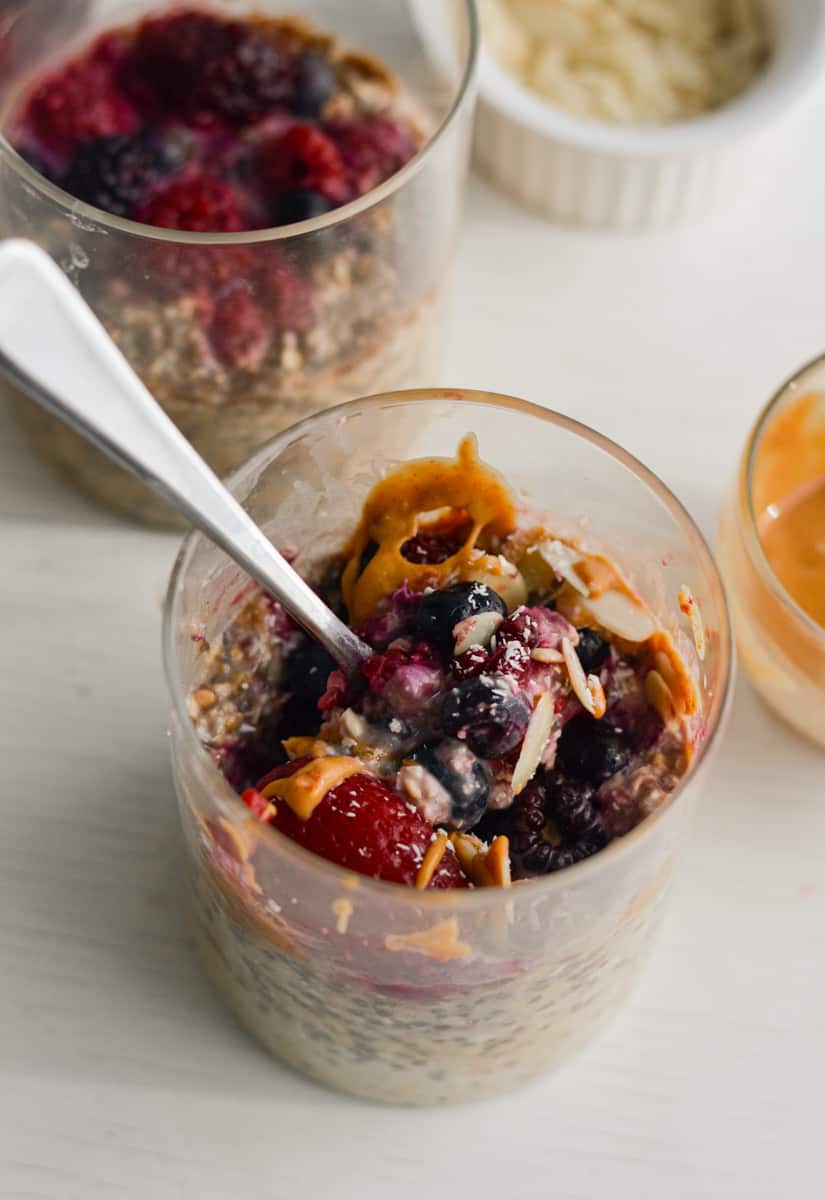 Overnight oats with frozen fruit and topped with peanut butter.