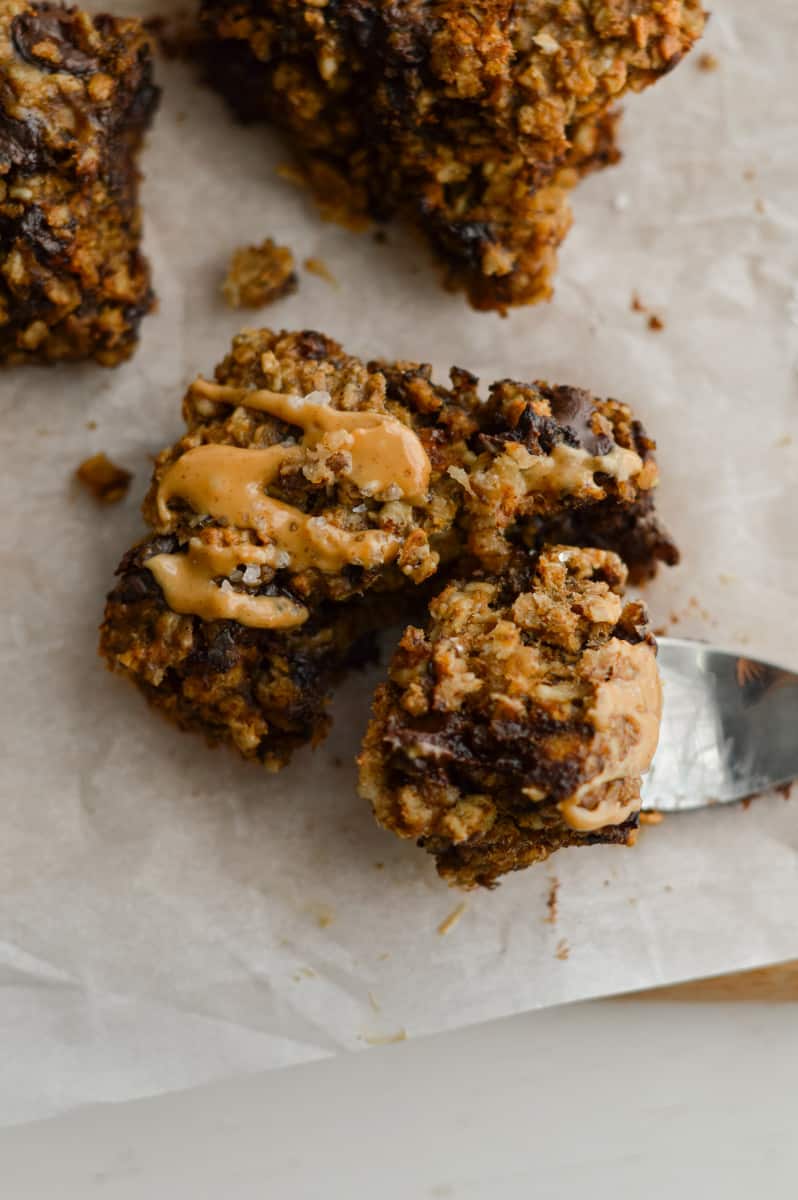 Taking a bite of peanut butter banana oatmeal bars.