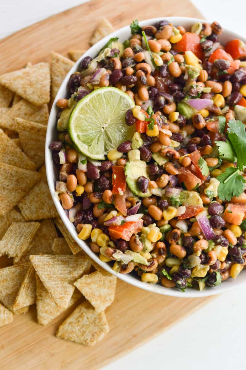 Vegan cowboy caviar served with chips.