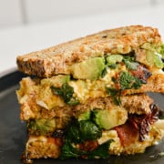 Air fryer breakfast sandwich cut in half and stacked.