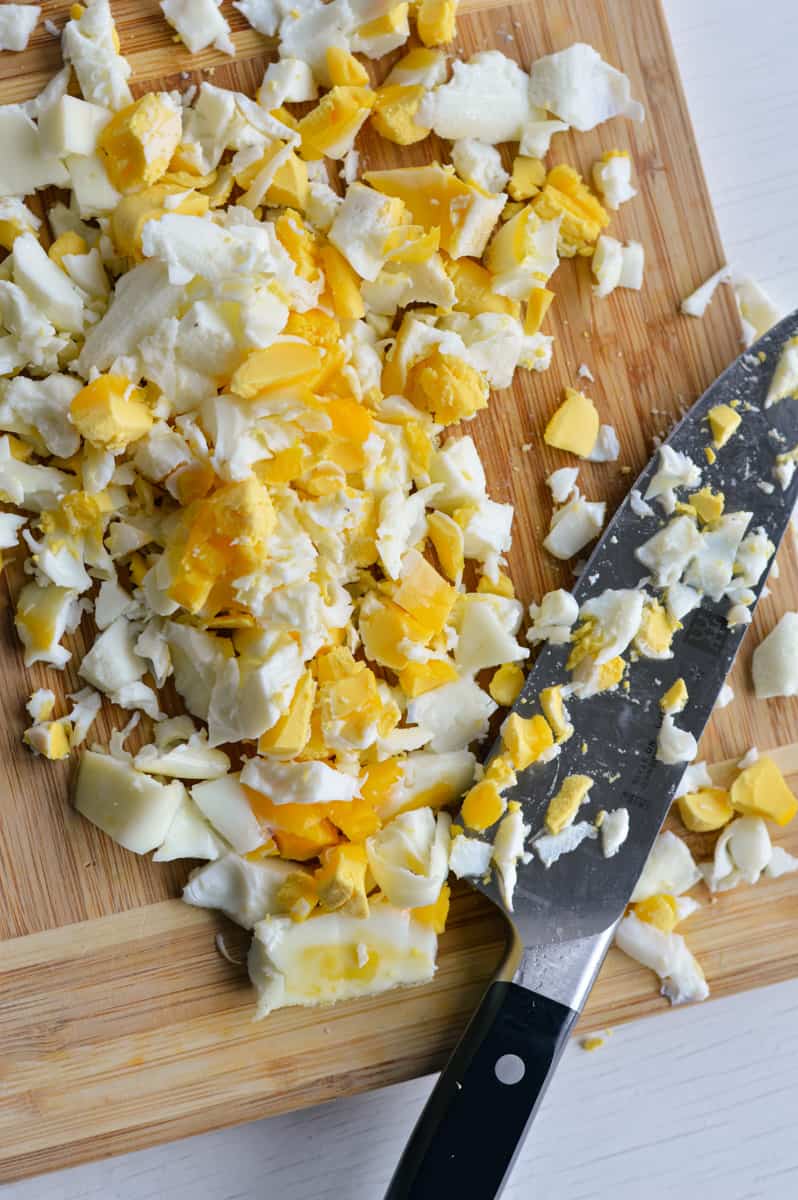 Breaking up hard boiled eggs.