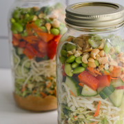 Two jars of mason jar peanut salad.