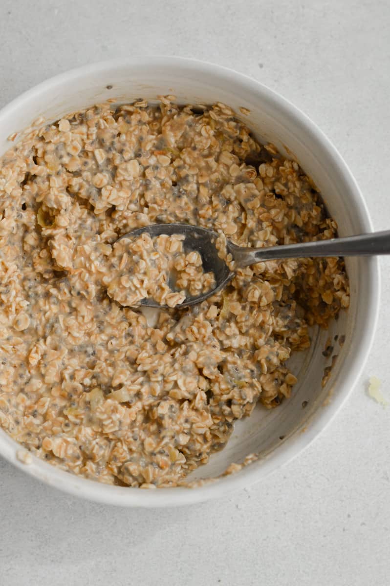 combining oat base ingredients for lemon cheesecake overnight oats