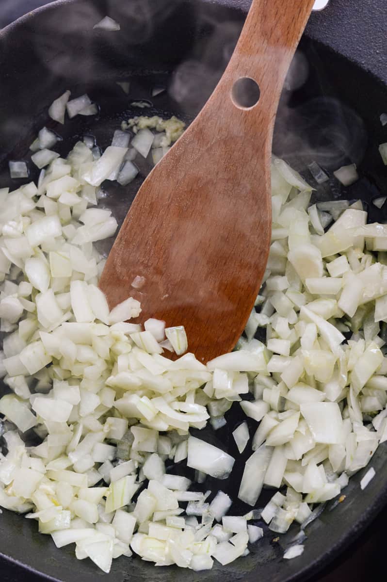 Sauteeing onions in a skillet.