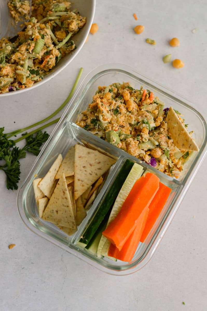 Adult lunchable with pita, sliced veggies and vegan chickpea salad.