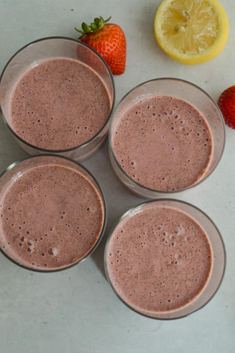 Dividing chia pudding between 4 jars.