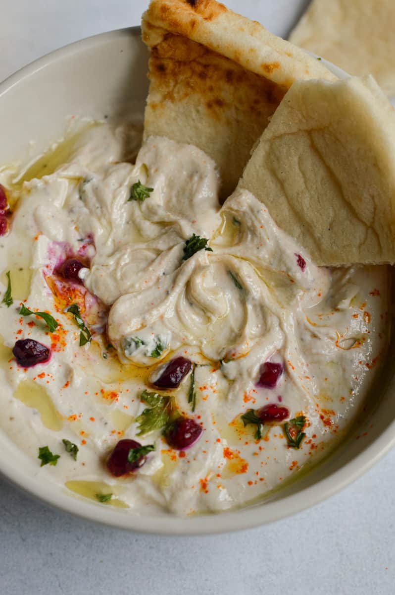 Tahini yogurt sauce served with pita.