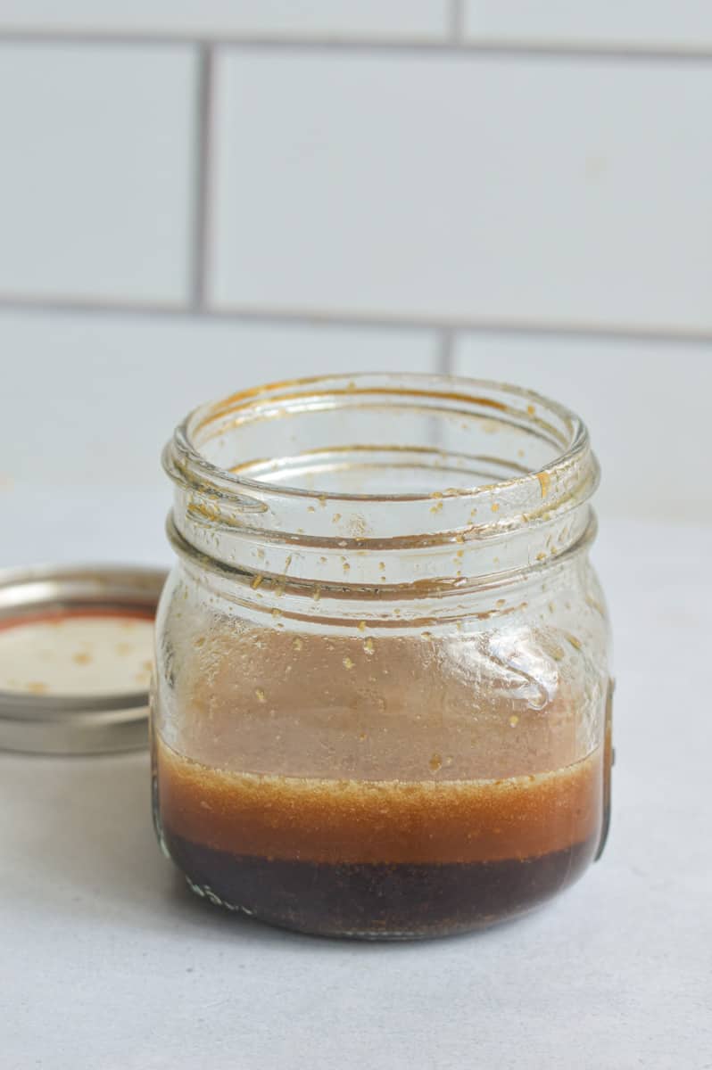 Jar of sesame ginger salad dressing.