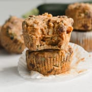 Vegan zucchini muffin with a bite.