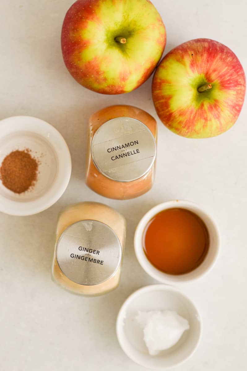 Ingredients including apples, cinnamon, ginger, nutmeg, coconut oil and maple syrup.