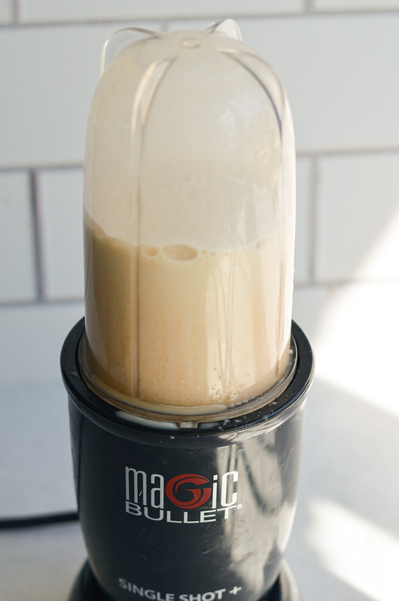 Frothing pumpkin cold foam in a blender.