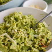 Creamy broccoli pasta with green pasta sauce.
